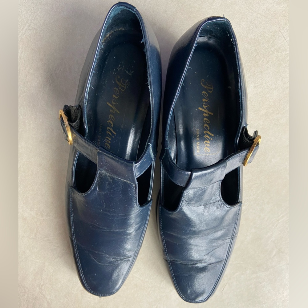Navy t-strap Mary Jane pumps